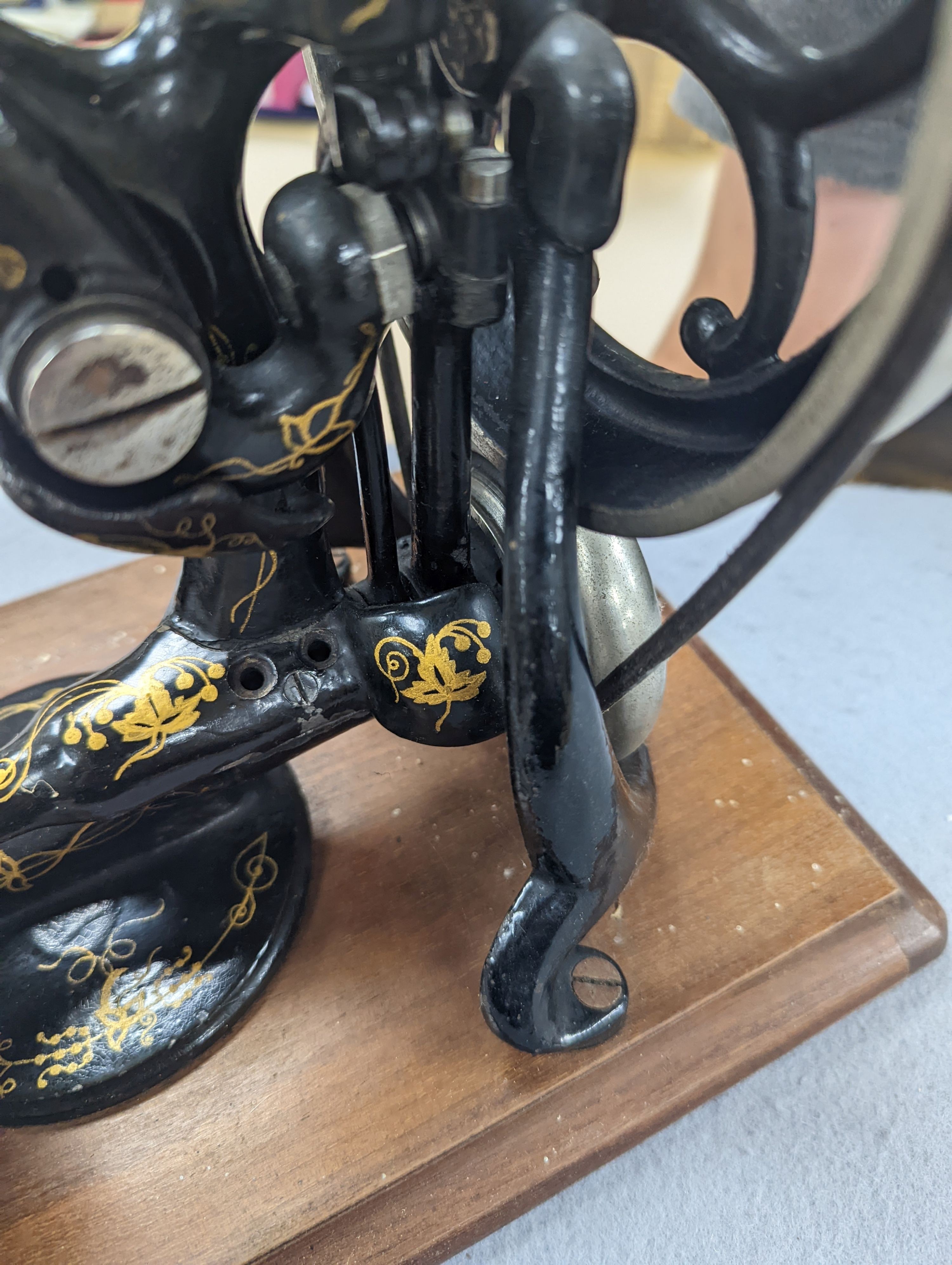 A Victorian sewing machine, Corona typewriter and two microscopes